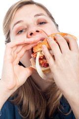 Woman eating hamburger