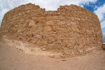 Fisheye view of ancient fortress ruin in the desert
