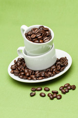 Cups on the green background