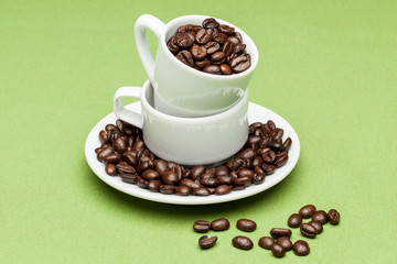 Cups on the green background