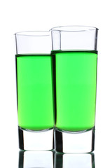Two glasses of absinthe isolated on white