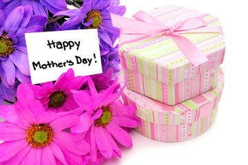 Mothers Day gifts - colorful daisies and gift boxes