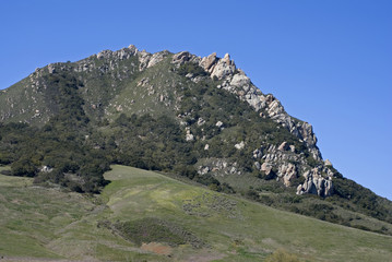 Rocky Hilltop against Blue Sky