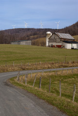 Farmland with wind turbines on the mountain top
Copy Space