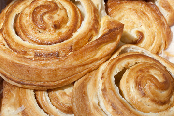 Fototapeta premium Close-up of many cinnamon rolls pastry, breakfest sweet roll.
