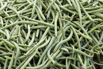 Pile of  string beans for sale at a farmers market