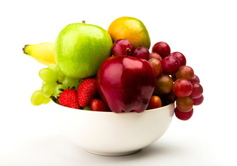 Fresh fruit on plate  Isolated on white