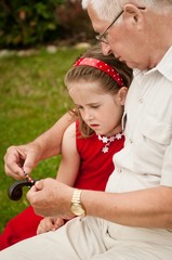 Happy retirement - grandparent with grandchild