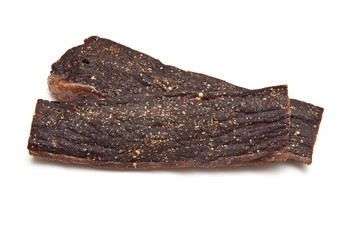 South African biltong (beef) isolated on a white background