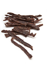 South African biltong strips  isolated on a white background