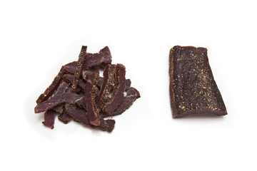 South African biltong (beef) isolated on a white background