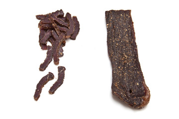 South African biltong (beef) isolated on a white background