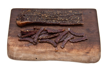 South African biltong (beef) isolated on a white background
