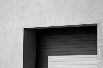 Minimalistic garage doors, architecture detail, black and white