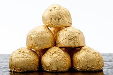 chocolates in a gold foil papper