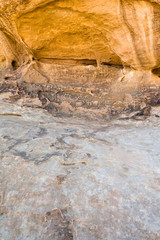 Petroglyphs on sandstone rock in Wadi Rum dessert