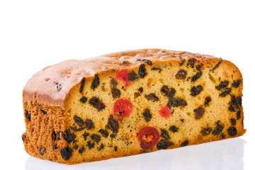 Succulent fresh mixed fruit cake on white background.