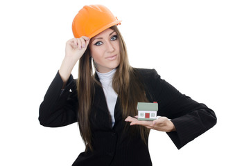 The business woman with small model of the house