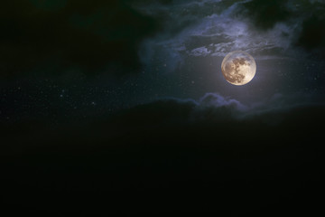 Cloudy full moon