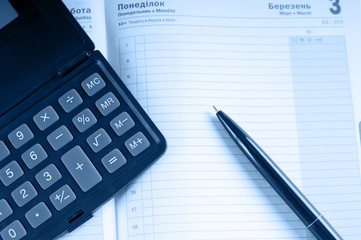 organizer and pen toned blue