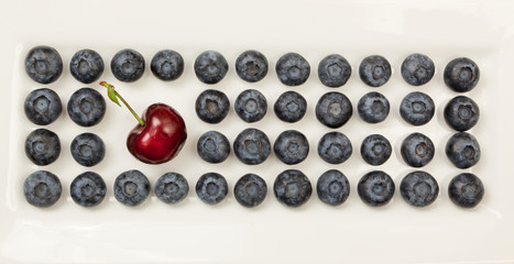 Blueberries and a Cherry