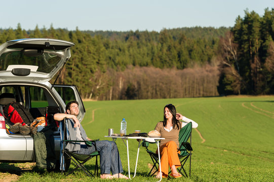 Camping car young couple enjoy picnic countryside