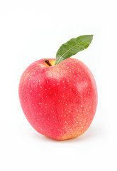 Healthy food. Fresh red apple with green leaf on a white backgro