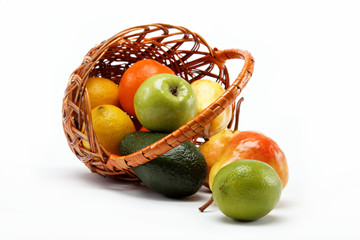fruits in basket isolated on a white background.
