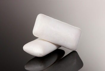 Chewing gums on gray background
