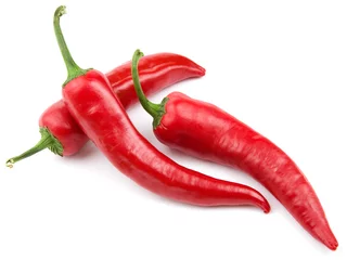 Wall murals Hot chili peppers Three red hot chili pepper isolated on a white background