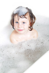 smiling child having bath