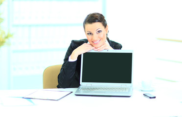 Beautiful business woman in the office, presentation