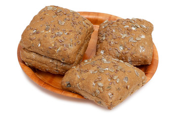 Bread on wooden plate