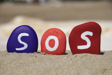 sos, save our souls on colourful pebbles © yournameonstones