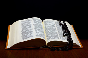 Christian Holy Bible with Crucifix and rosary