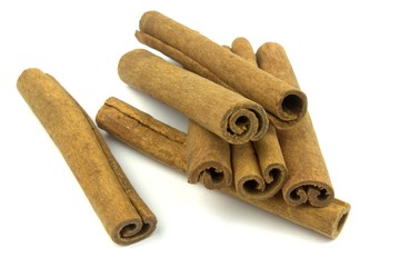 Cinnamon sticks on white background.