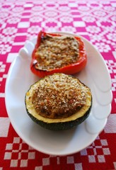 Stuffed peppers and zucchini filled with minced tofu with herbs
