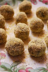 Vegetarian meatballs with cereals and spinach ready to be fried