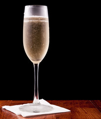 Champagne flute isolated on black
