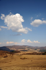 Autumn landscape with blue sky and cloud