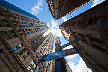 Low wide angle view of Manhattan skyscrapers, New york City.