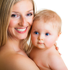 Mother holding cute infant girl isolated on white