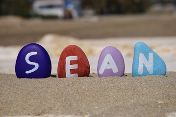 Sean, male name on colourful pebbles