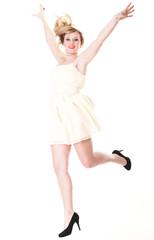 Young female Happy woman jumping with arms up isolated