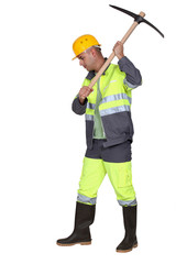 Laborer using pickaxe on white background