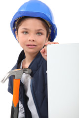 Little girl dressed as construction worker