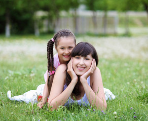 Young mother and her young daughter