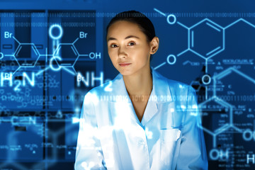 Young chemist working in laboratory