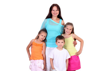 Fototapeta na wymiar Mother with her three children in studio
