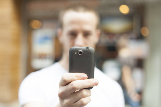 Men Take Photo With Mobile Phone